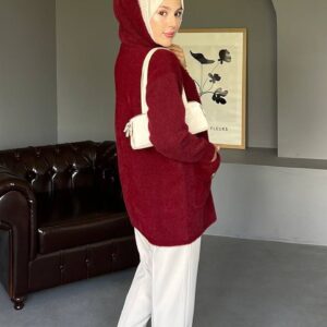 Kapüşonlu Angora Uzun Hırka Tunik, yumuşacık angora kumaşıyla sıcak tutar, şık tasarımıyla tarzınızı tamamlar. Standart beden uyumlu, günlük ve tesettür kombinleri için ideal.