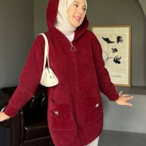 Kapüşonlu Angora Uzun Hırka Tunik, yumuşacık angora kumaşıyla sıcak tutar, şık tasarımıyla tarzınızı tamamlar. Standart beden uyumlu, günlük ve tesettür kombinleri için ideal.