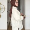 fisto brode oversized tunikler Hepdolu'da! Beyaz ve bej renkleri, salaş ve şık kesimiyle yazın vazgeçilmezi olun. En uygun fiyatla hemen keşfedin!