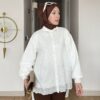 fisto brode oversized tunikler Hepdolu'da! Beyaz ve bej renkleri, salaş ve şık kesimiyle yazın vazgeçilmezi olun. En uygun fiyatla hemen keşfedin!