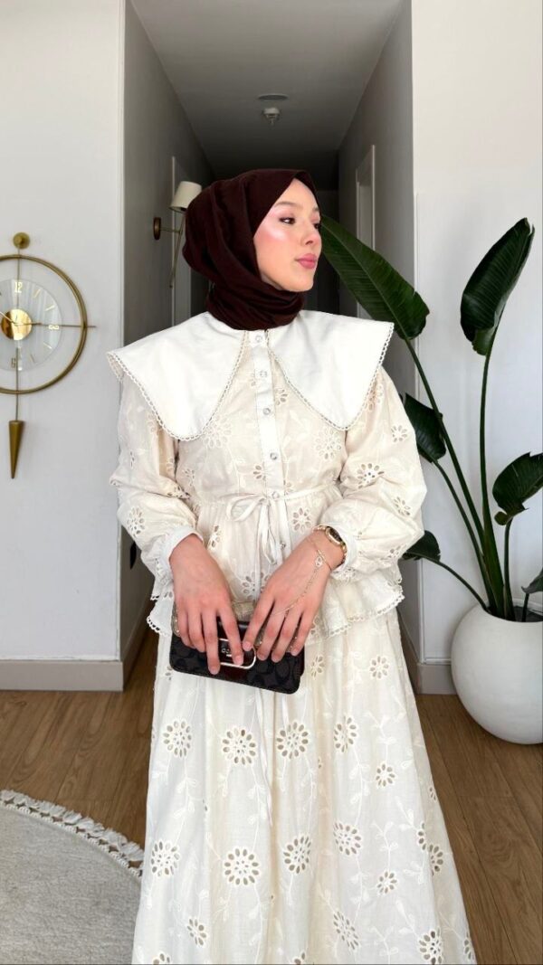 Fisto detaylı, %50 pamuklu nefes alan ikili takım modellerini keşfedin. Yaz sezonuna özel şık ve konforlu kombin seçenekleri hepdolu.com'da!